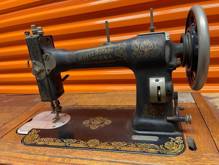 Close up of treadle sewing machine. 