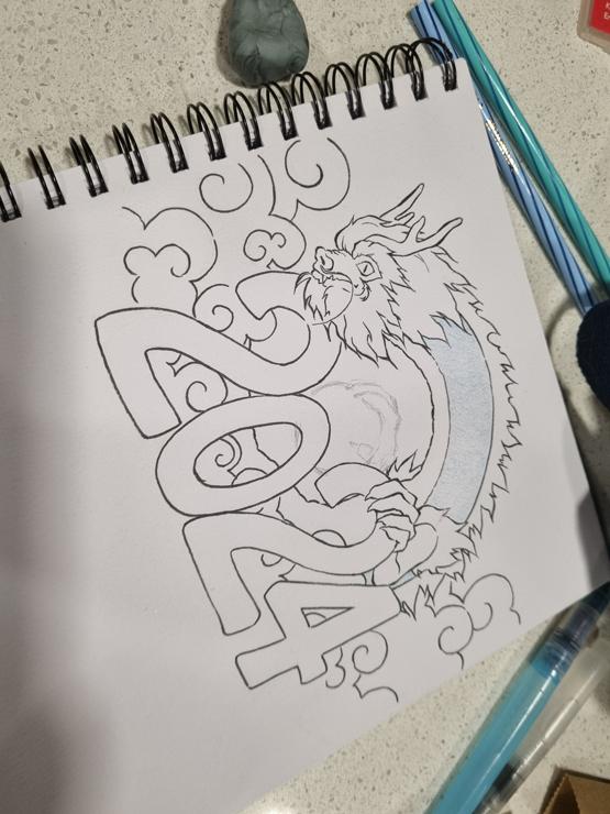 Photo of a drawing on a sketch book, partially completed. Most of the lines are inked, one section has been timidly filled in with a light colour. 